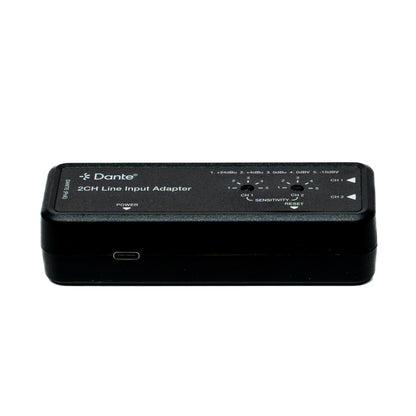 Black 2CH Line Input Adapter with Dante logo on a white background